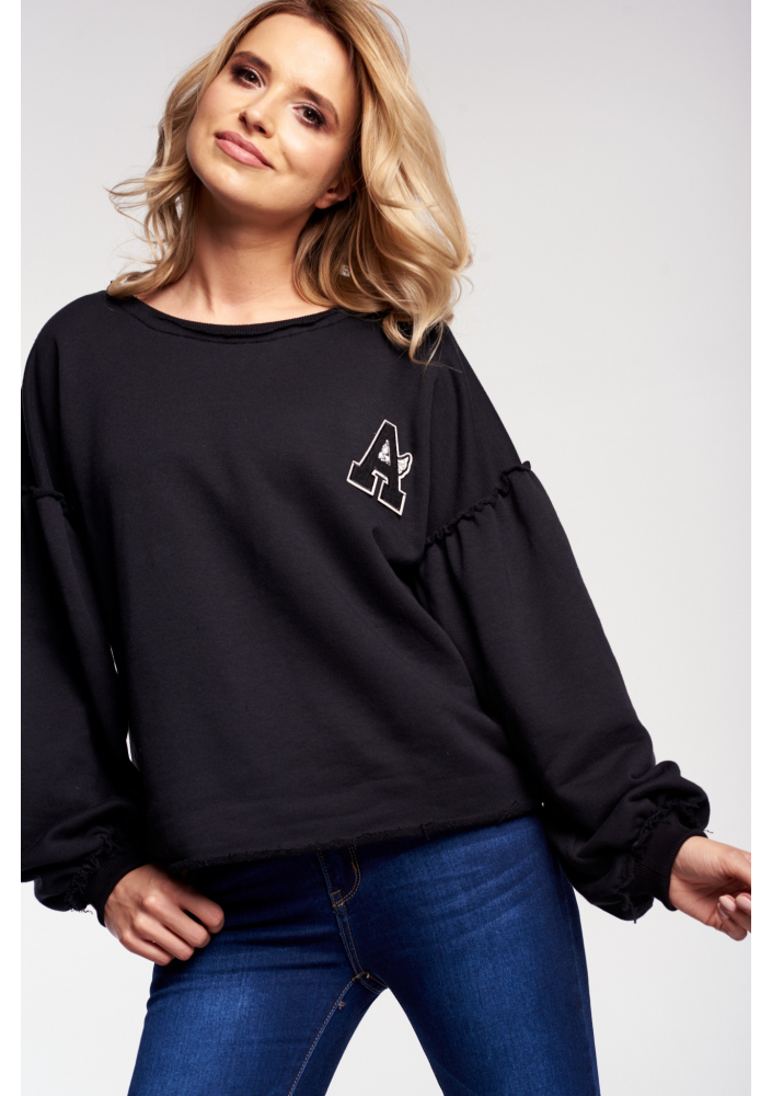 BLUZA Z SUROWYM WYKOŃCZENIEM I NASZYWKĄ