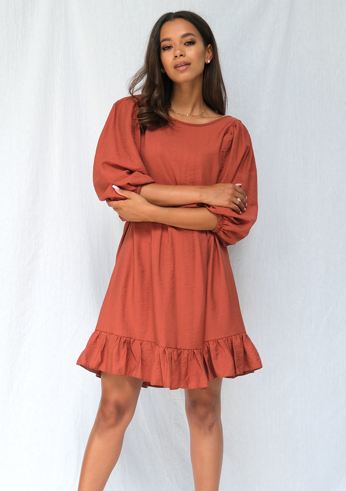 Jesienna sukienka z szerokim rękawem powder orange