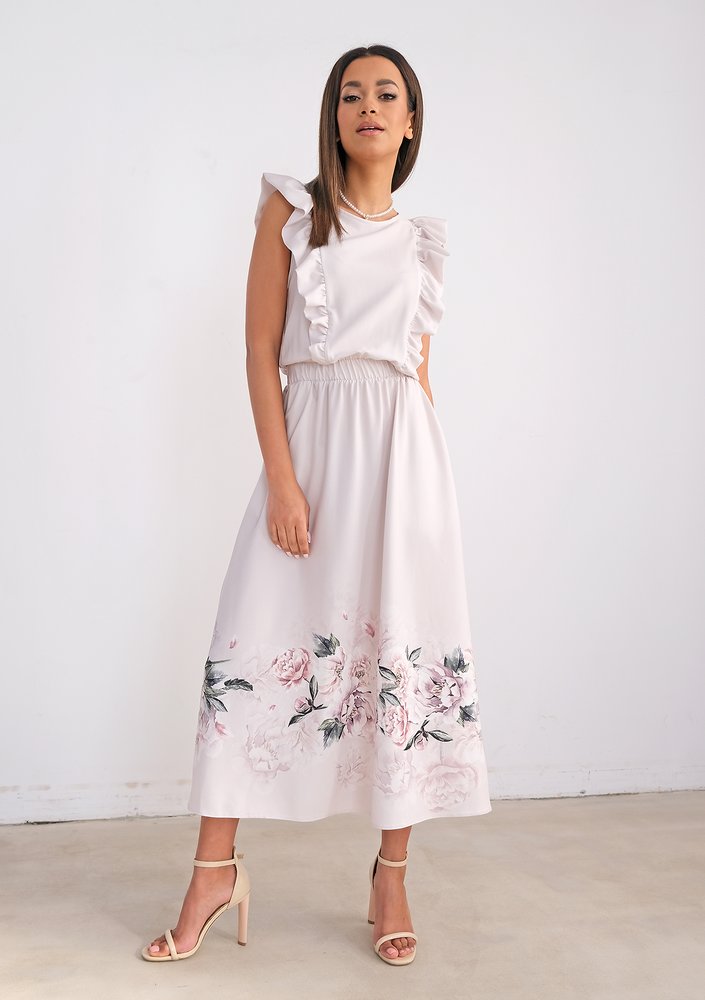 Light-coloured dress with flower print and frills