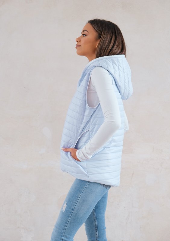 Quilted sleeveless light blue jacket