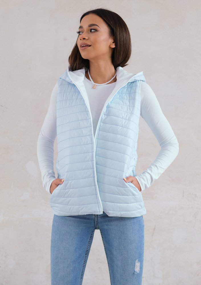 Quilted sleeveless light blue jacket