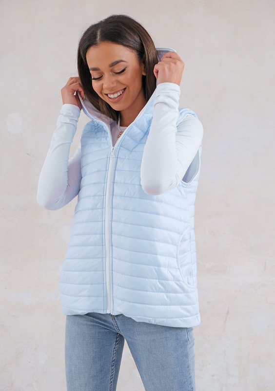 Quilted sleeveless light blue jacket