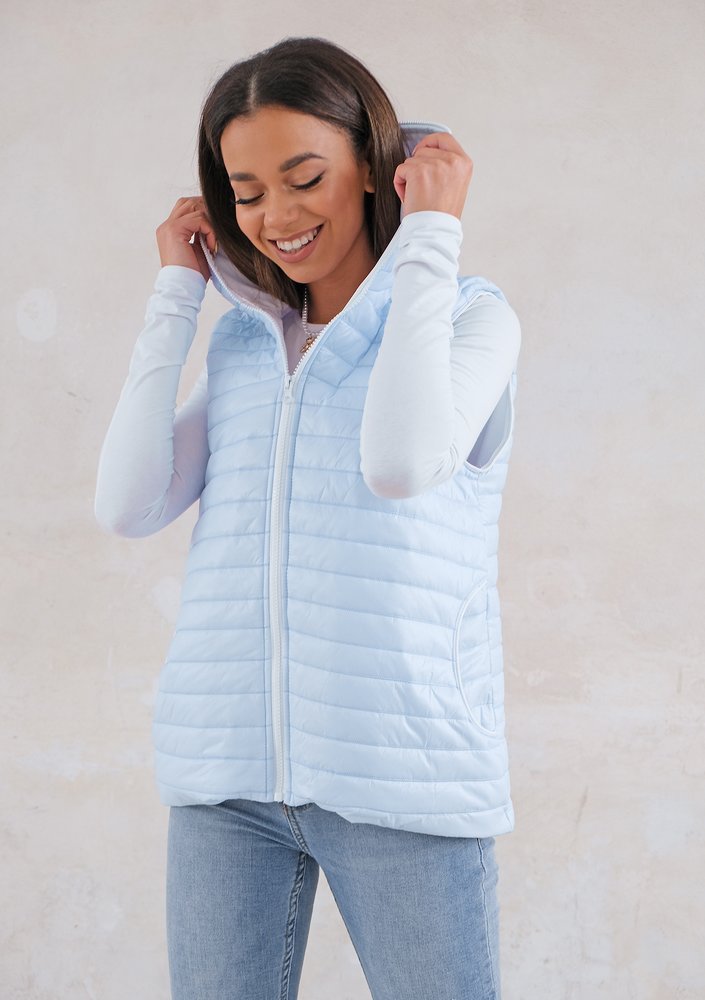 Quilted sleeveless light blue jacket