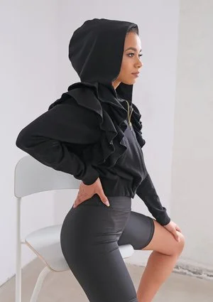 Black sweatshirt with frills and a zipper
