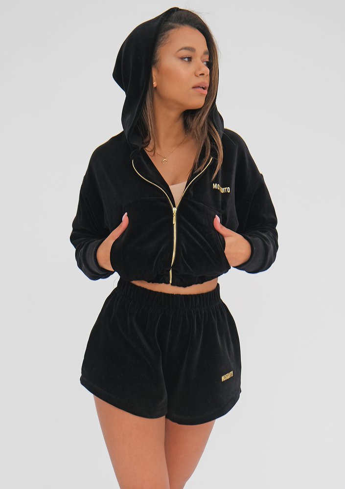 Black velvet sweatshirt with a zipper closure