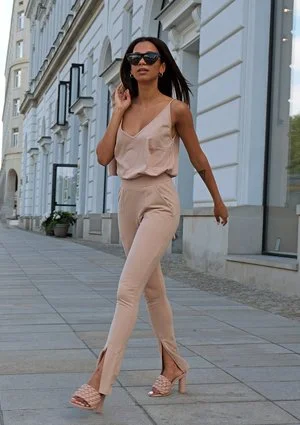 Beige pants with a slit