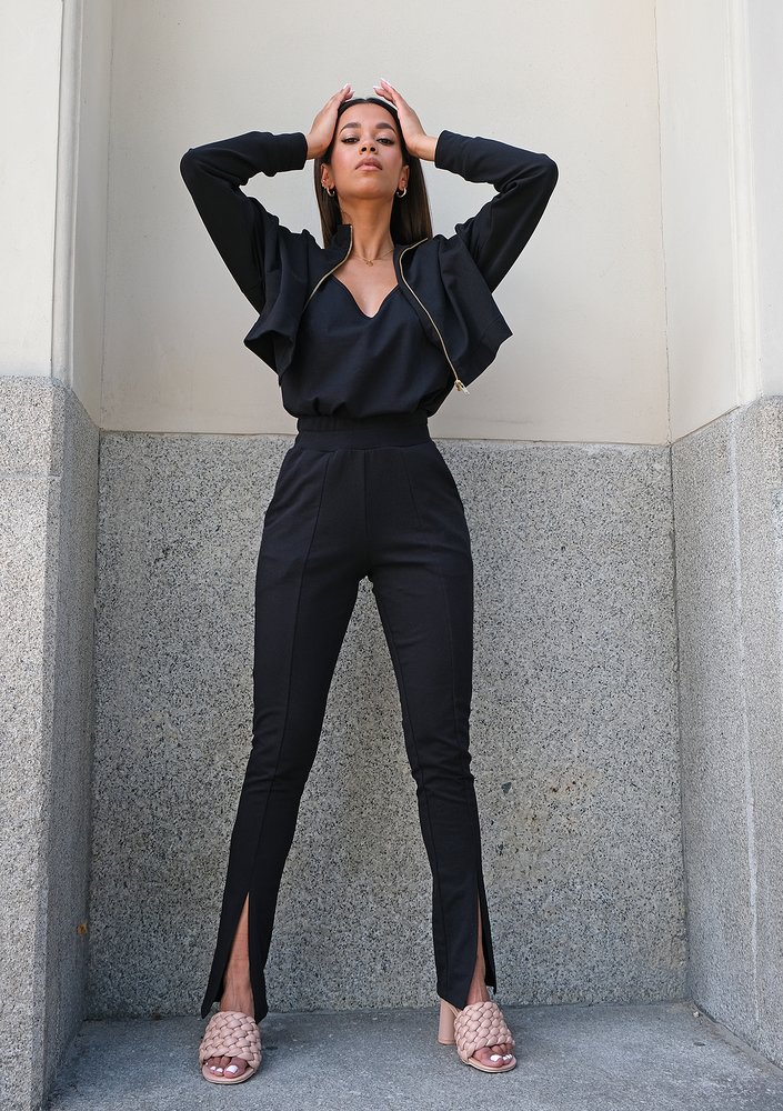 Black pants with a slit