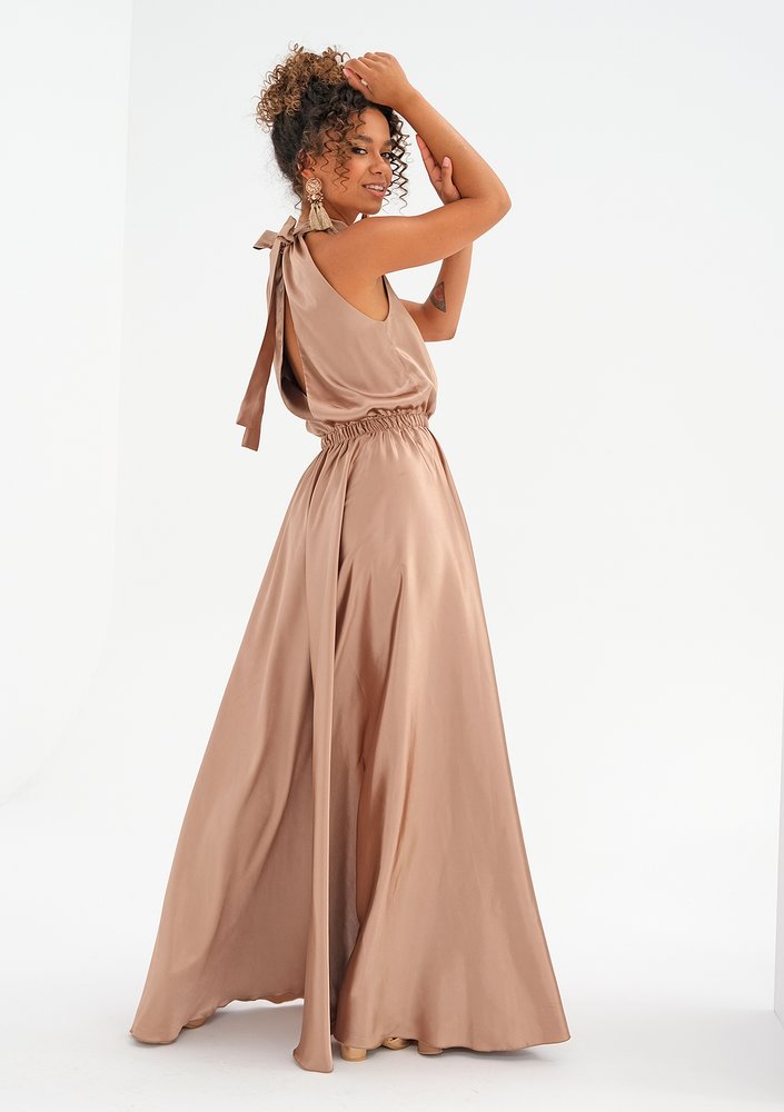 Maxi beige satin dress with a halter neckline