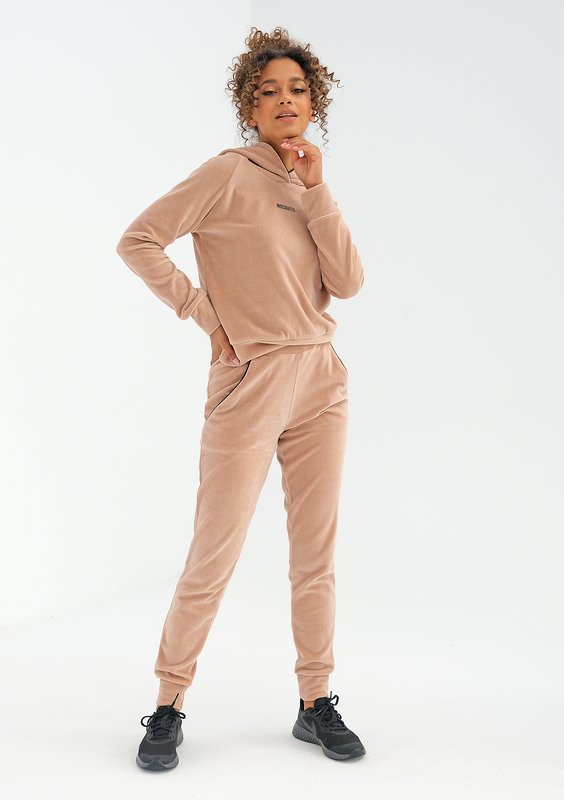 Beige velvet sweatpants with black details
