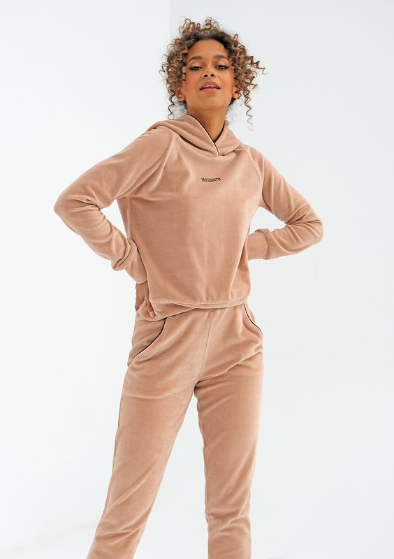 Beige velvet sweatpants with black details