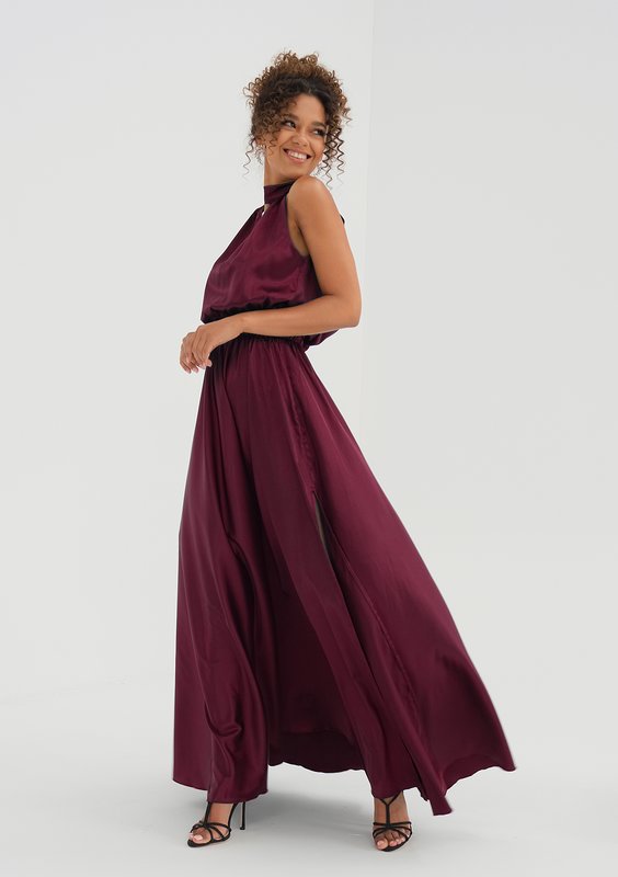 Maxi green satin dress with a halter neckline