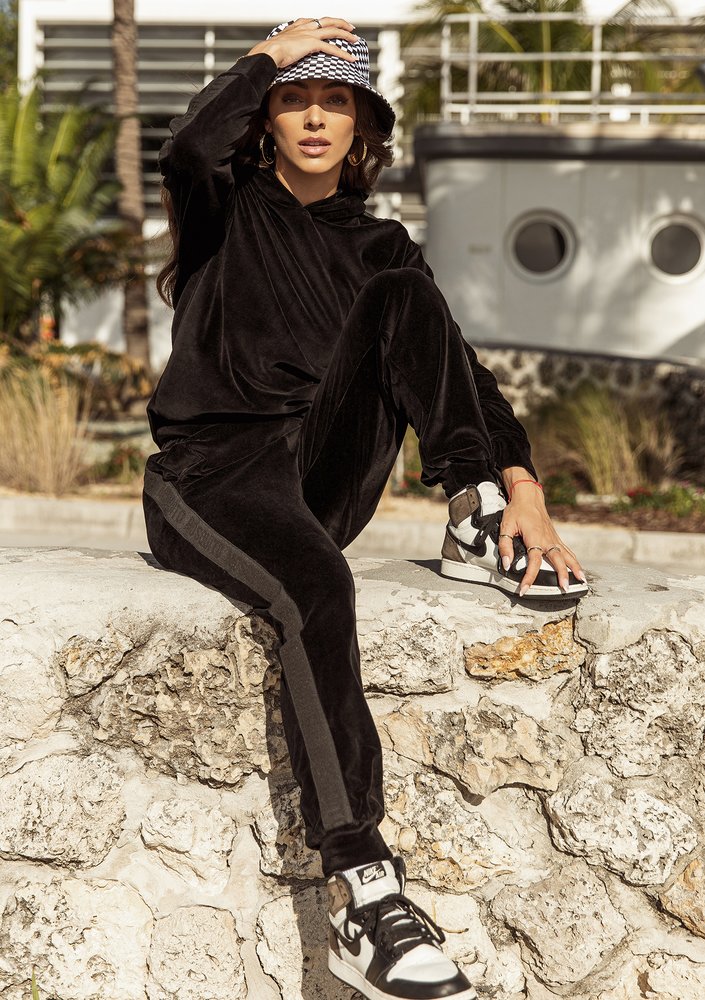 Black velvet sweatpants with stripes