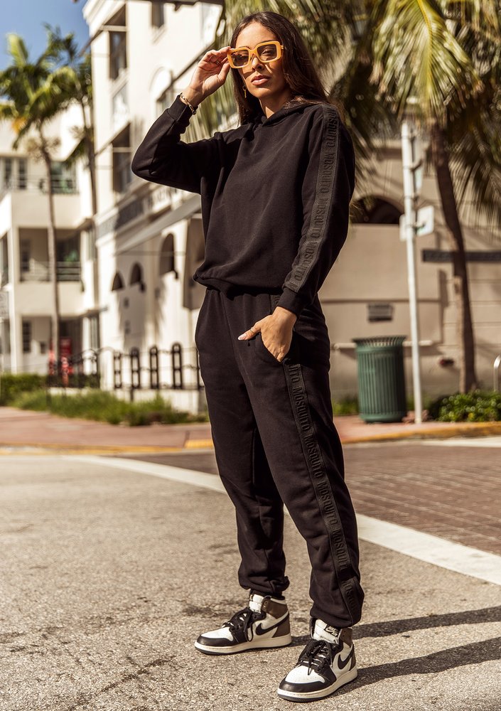 Black sweatpants with stripes