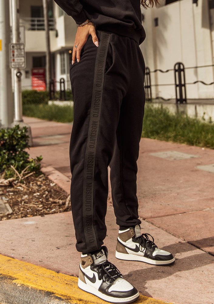 Black sweatpants with stripes