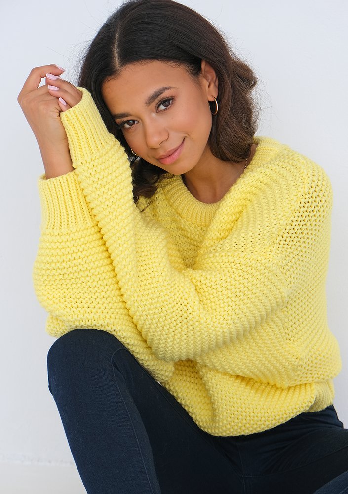 Loose yellow sweater