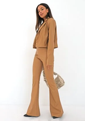 Beige eco leather flared trousers