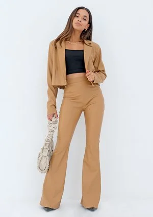 Beige eco leather flared trousers