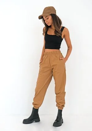 Beige eco leather jogger trousers