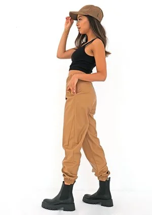 Beige eco leather jogger trousers
