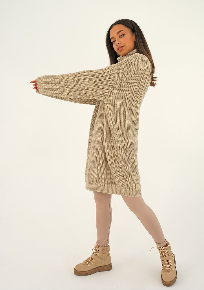 Beige turtleneck sweater with a silver thread