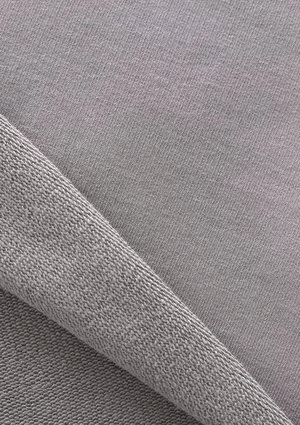 Grey sweatpants with a lime logo