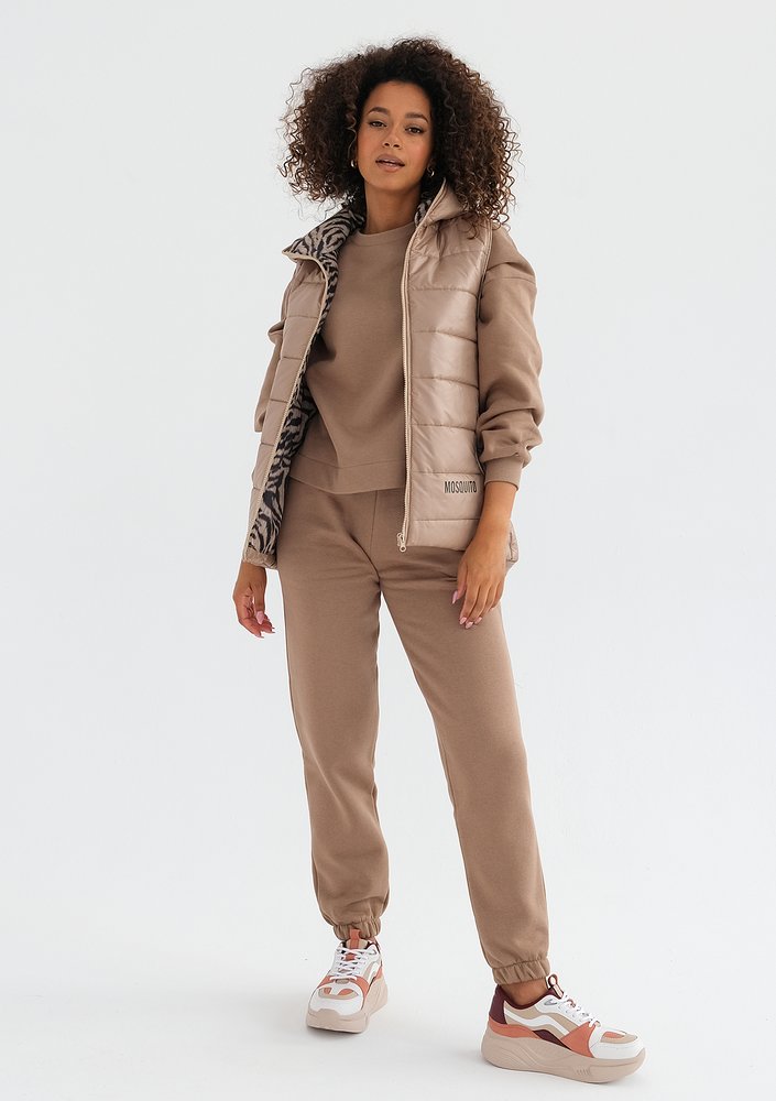 Vicky - Quilted beige zebra printed sleeveless jacket