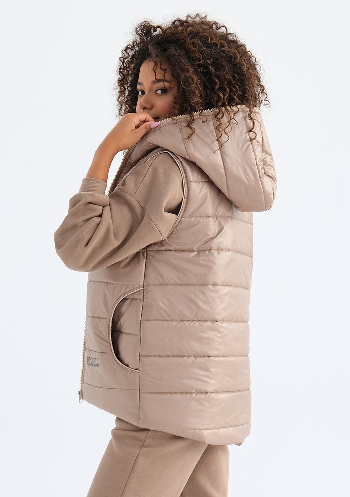 Vicky - Quilted beige zebra printed sleeveless jacket