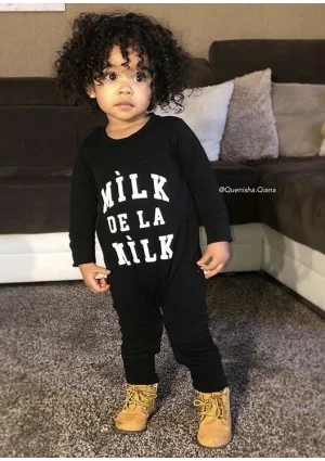 Black long sleeved romper "milk de la milk"
