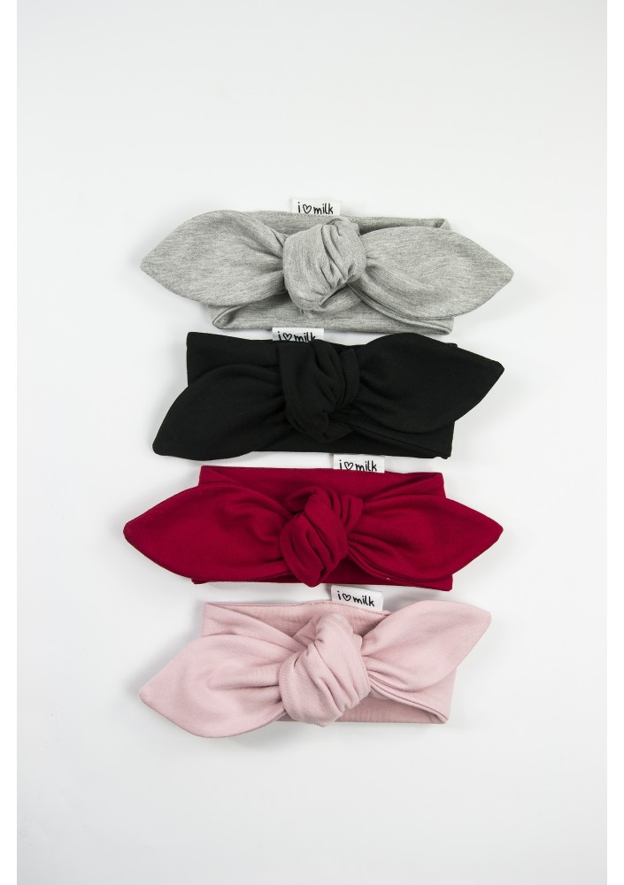 Powder pink headband with a bow