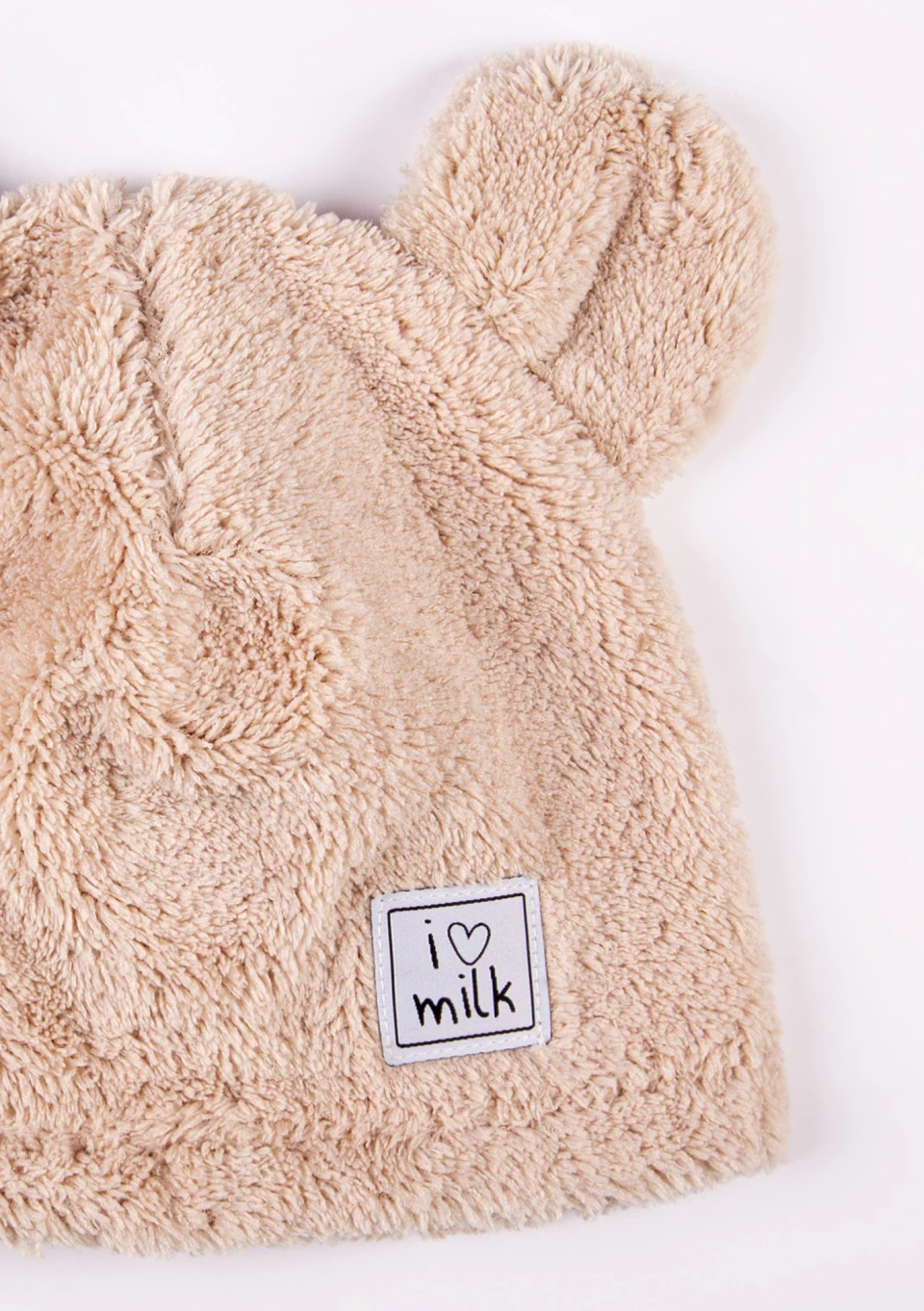Beige plush beanie with teddy ears