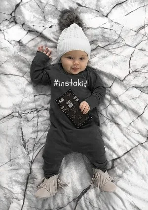 Black long sleeved romper "instakid"