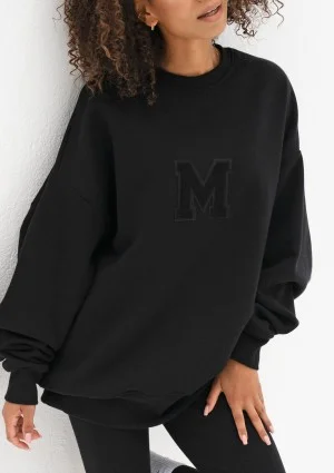 Vibe - Czarna bluza oversize z naszywką M