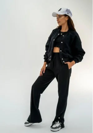 - Black snap-buttoned sweatpants