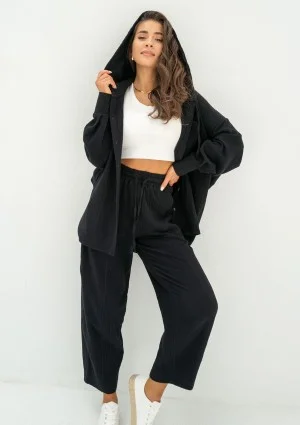 - Black muslin jogger pants