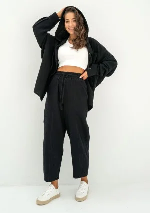 - Black muslin jogger pants