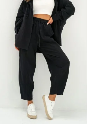 - Black muslin jogger pants