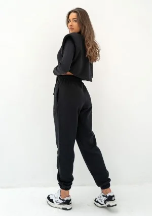 Kolee - Black sweatpants with a logo