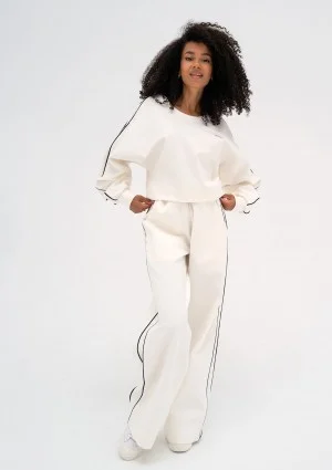 Cody - Ecru pants with trims