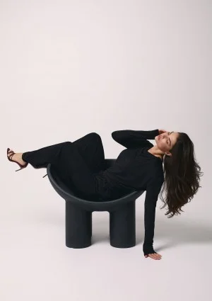 Drape - Black top with elegant shoulder pads