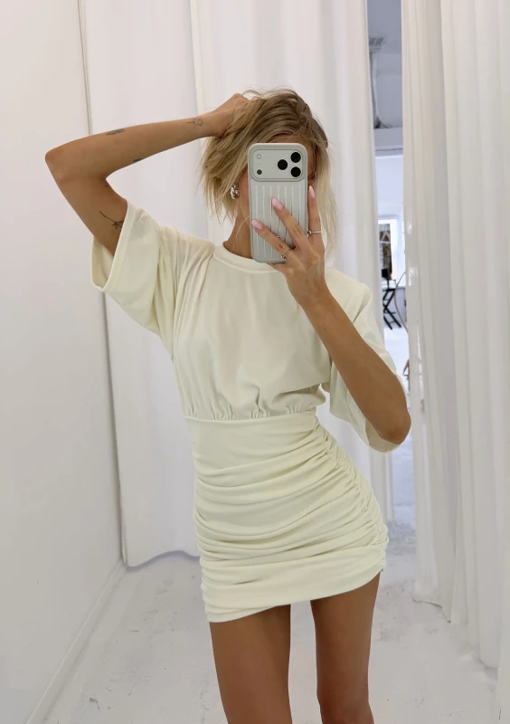 Leya - Draped creamy mini dress with shoulder pads