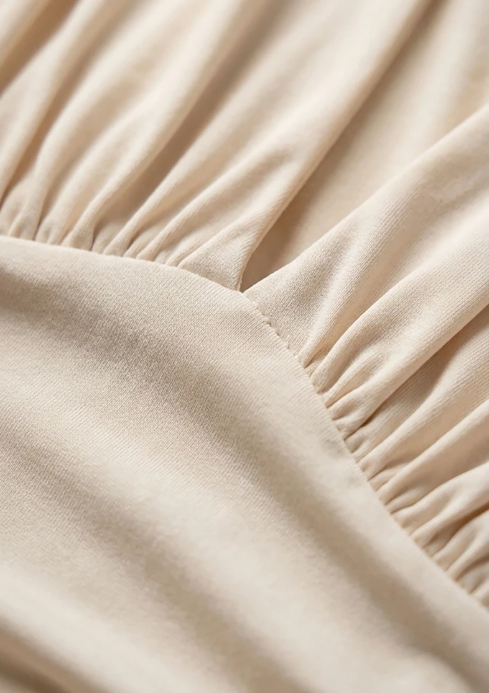 Noire - Creamy draped mini dress