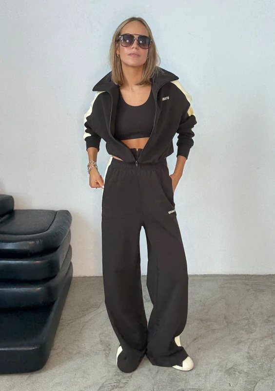 - Dark chocolate brown sweatpants with stripes