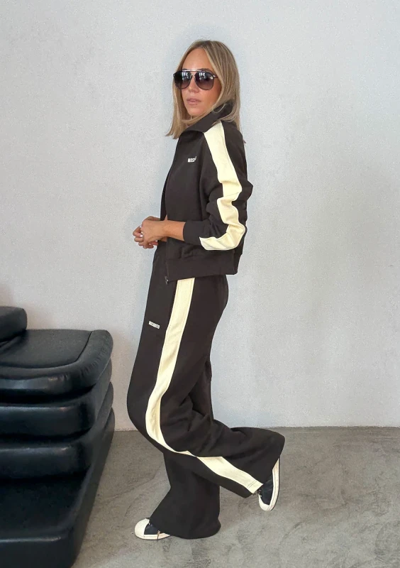 - Dark chocolate brown sweatpants with stripes