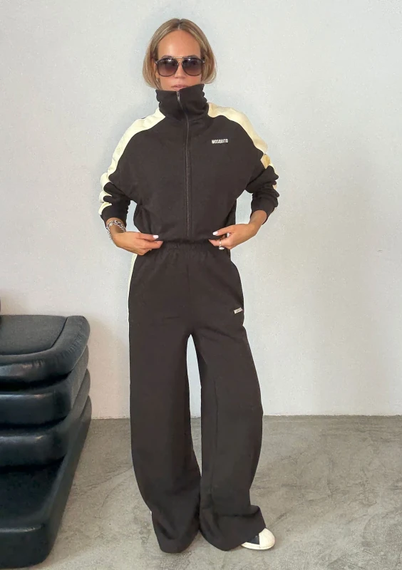 - Dark chocolate brown sweatpants with stripes