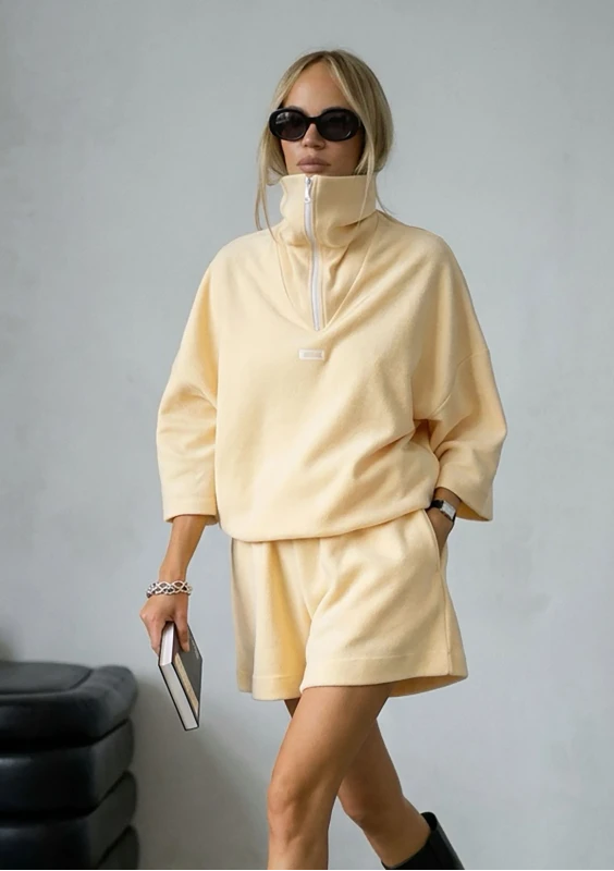 Yale Crop - Pale banana yellow jumper with a high zipped collar