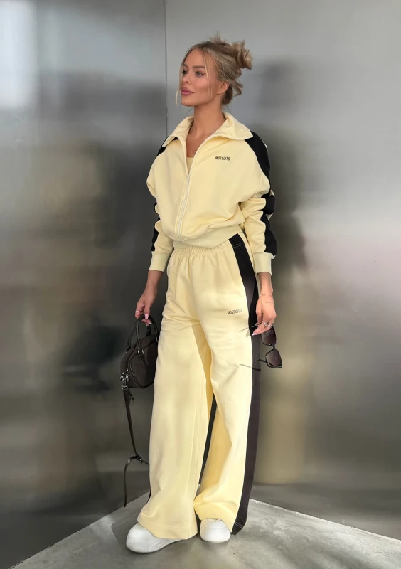 Cano Stripe - Spodnie dresowe z lampasami Pale Banana