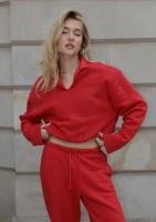 Wells - Cherry red jumper with shoulder pads