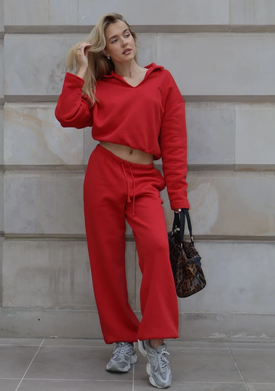 Wells - Cherry red jumper with shoulder pads